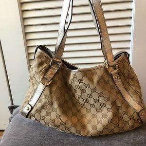 Gucci bag. GG canvas and gold with matching wallet